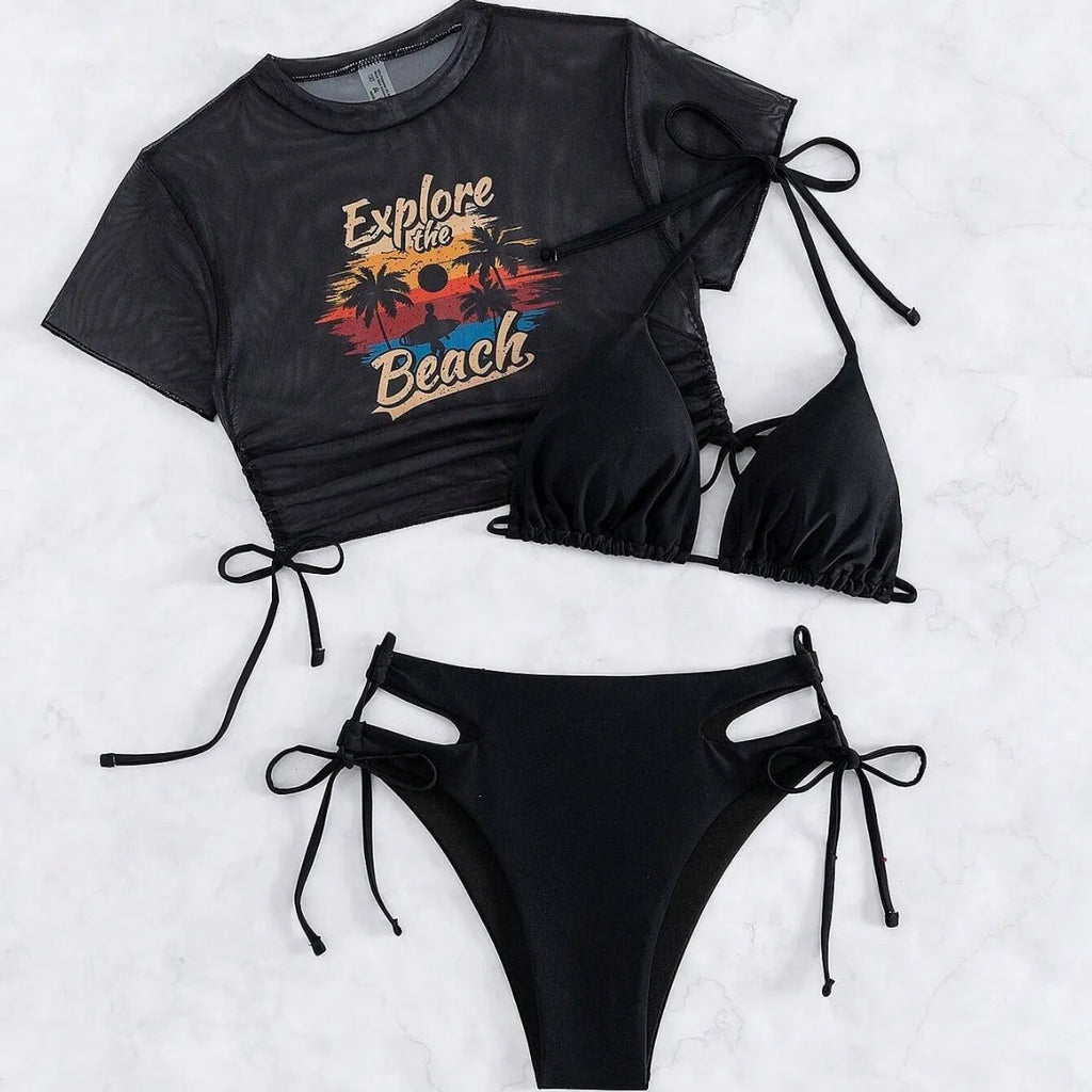 Women's three-piece bikini swimsuit set in black, showing short sleeve cover-up, bra, and bottoms.
