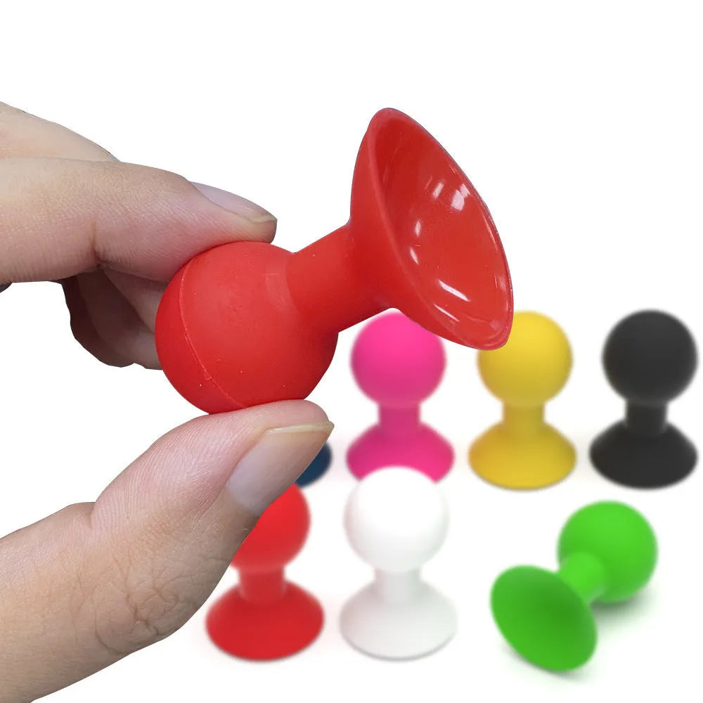Silicone octopus ball mobile phone holder in blue, yellow, green, red, white, black, rose red, and one-piece colours