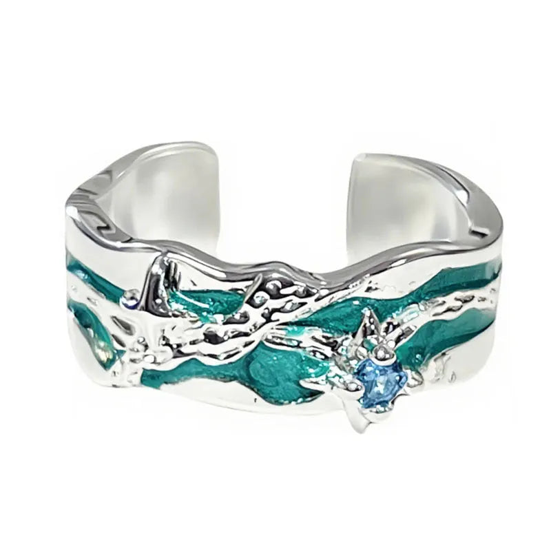 Mint green enamel astrology star ring with asymmetrical folded design on copper base