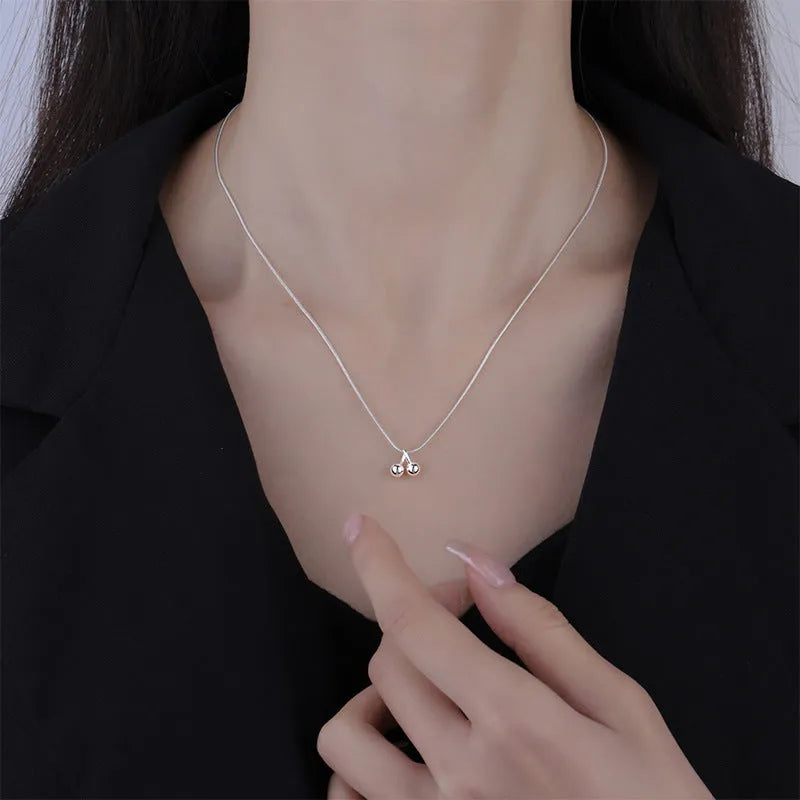 925 silver cherry fruit pendant on a snake bone chain necklace, adjustable from 21 to 50 cm.