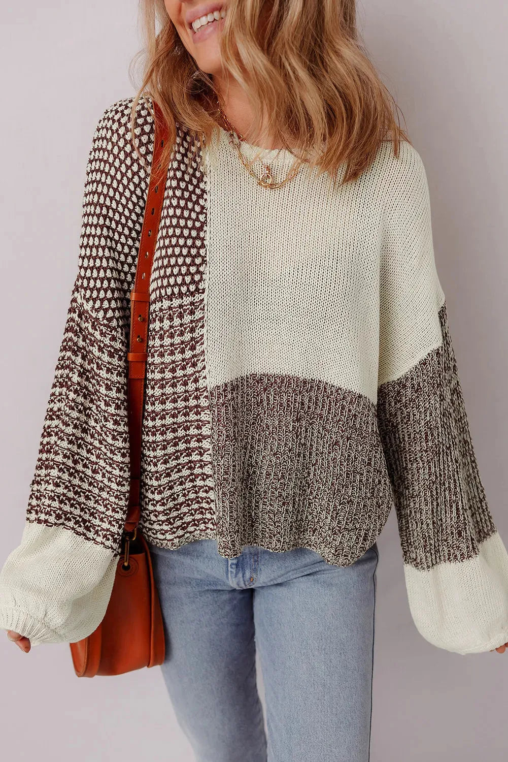 Dark khaki colour block women's loose knit sweater with a back tie and drop shoulders.