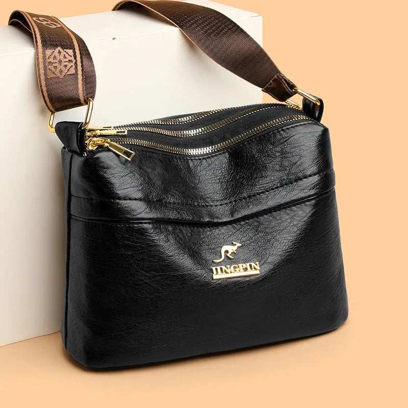 Large capacity cross body messenger bag in PU leather with crocodile pattern finish and multiple compartments