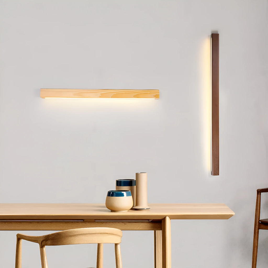 Walnut colour wood and acrylic log strip wall lamp in three lengths with integrated LED lighting