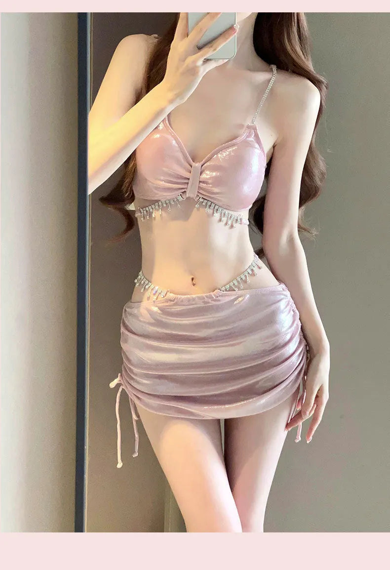 Women's solid colour polyester bikini swimsuit set in pink and black options.