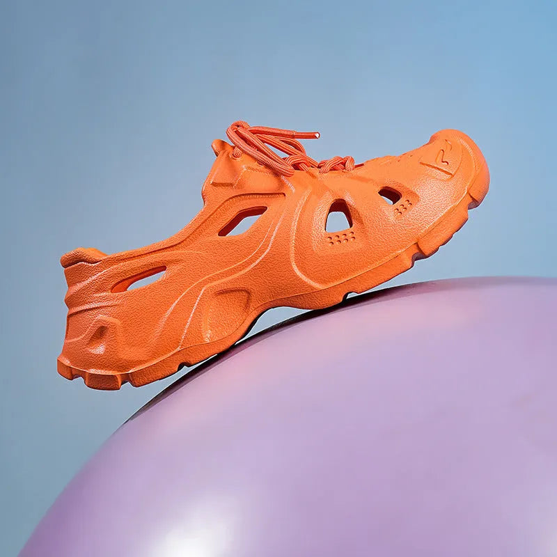 EVA thick bottom sandals in fluorescent green, orange red, and rose red colours showing unisex beach shoe design