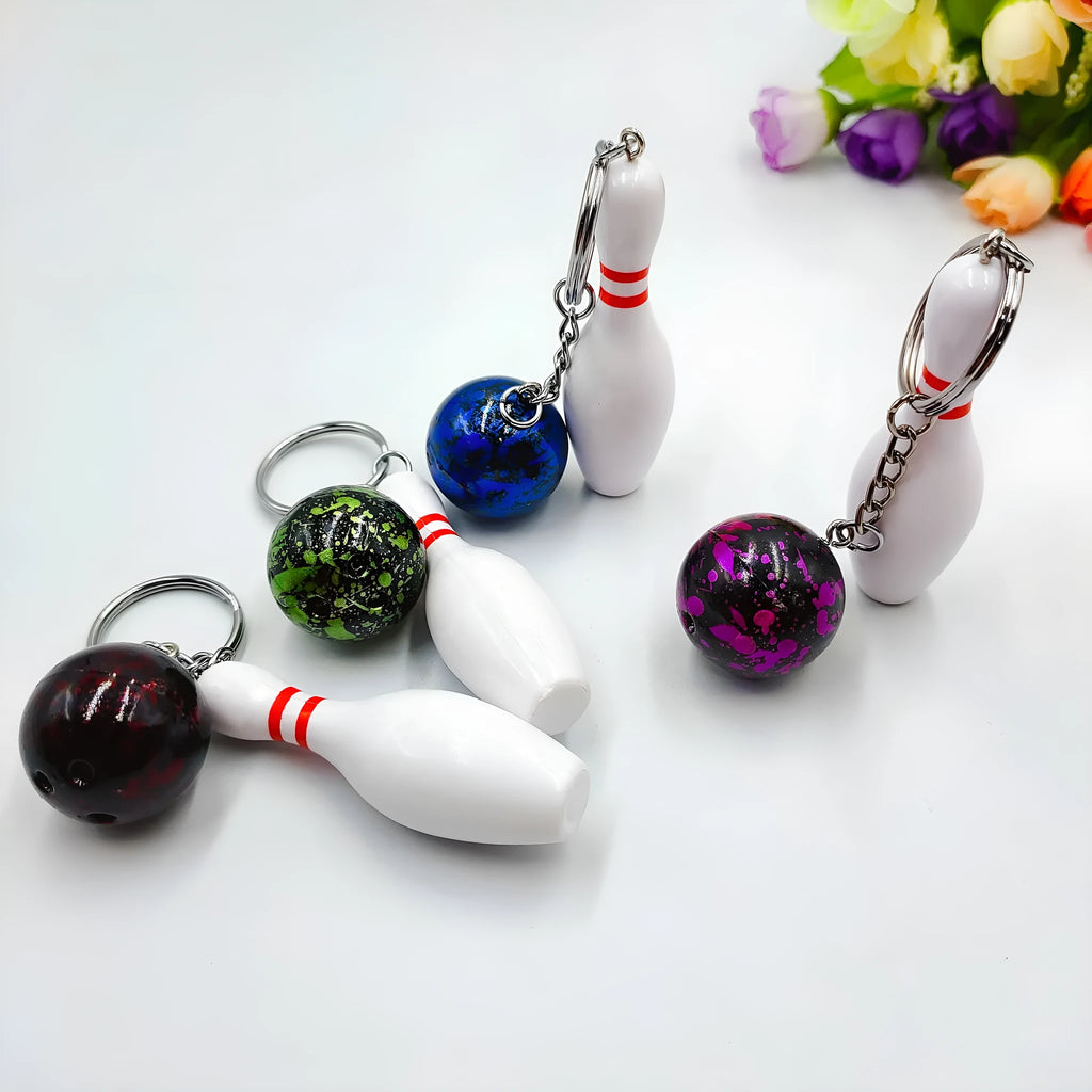 Mini bowling ball keychain pendant in dark red, blue, purple or green colour on keyring