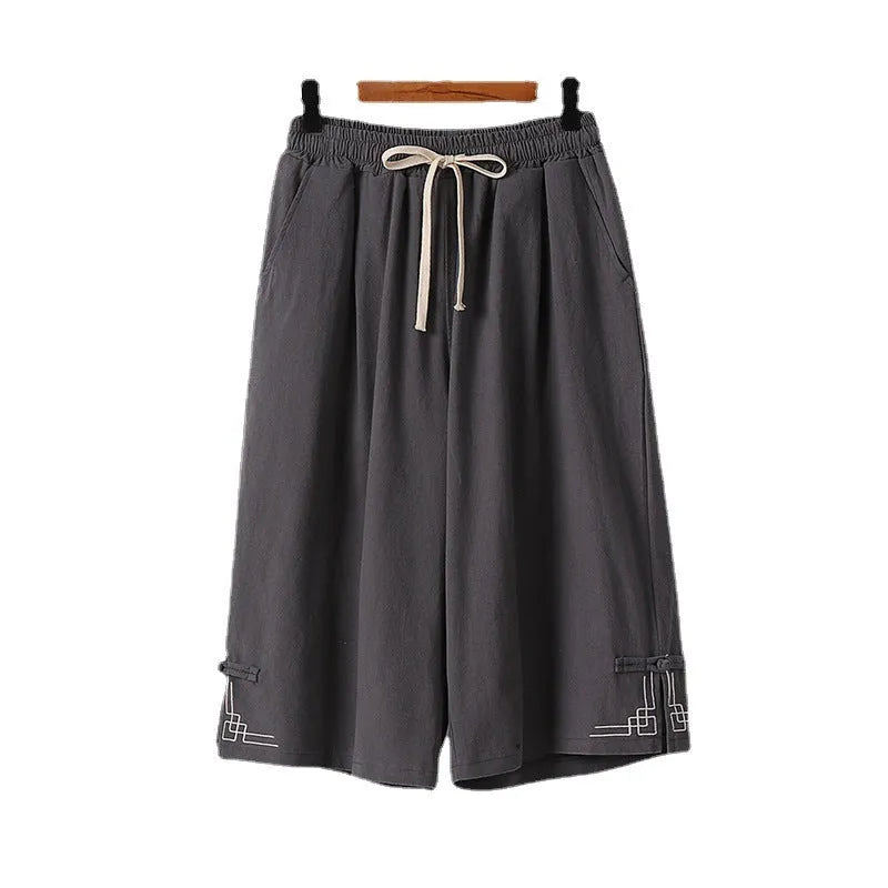 Wide leg cotton summer shorts in apricot colour with embroidery detail on a mid waist.