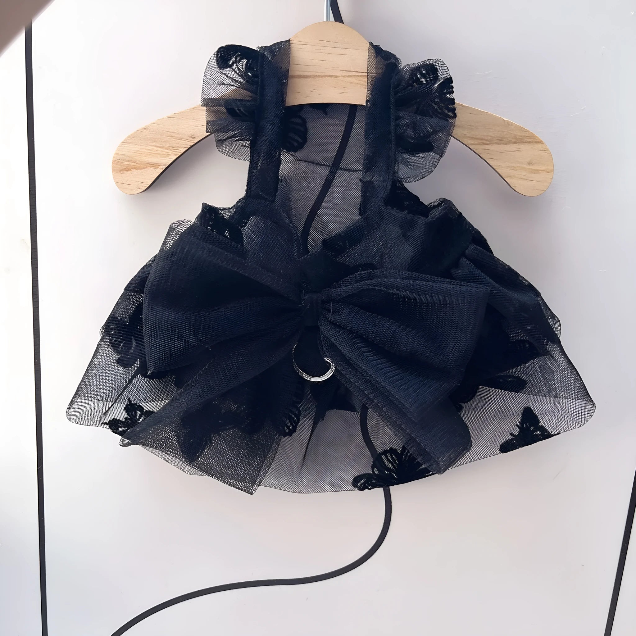 Black tulle princess skirt for a small dog or cat on a mannequin.