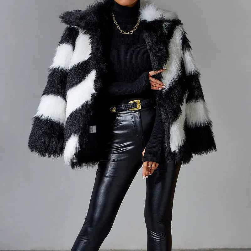 Faux fur coat with contrast lapel and detachable fur collar in shown colour.