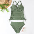 Women's high-waisted nylon bikini set in a solid colour on a mannequin.