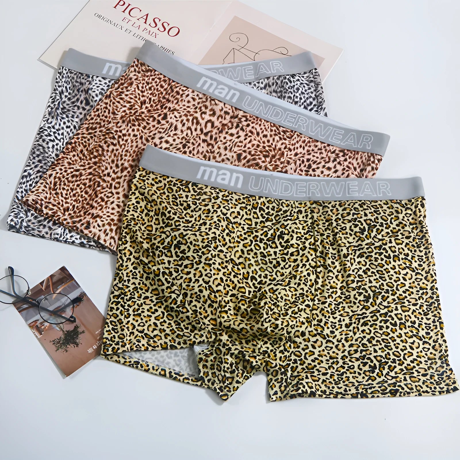 Men's leopard print underwear in polyester fabric with mid-waist design for large sizes