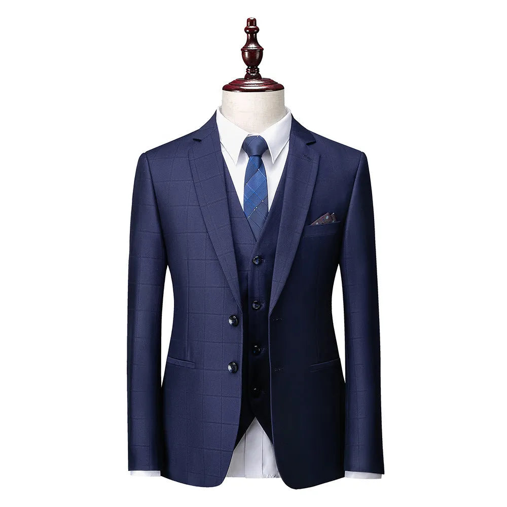 Men's navy blue slim fit three-piece suit with cotton blend fabric for business casual occasions
