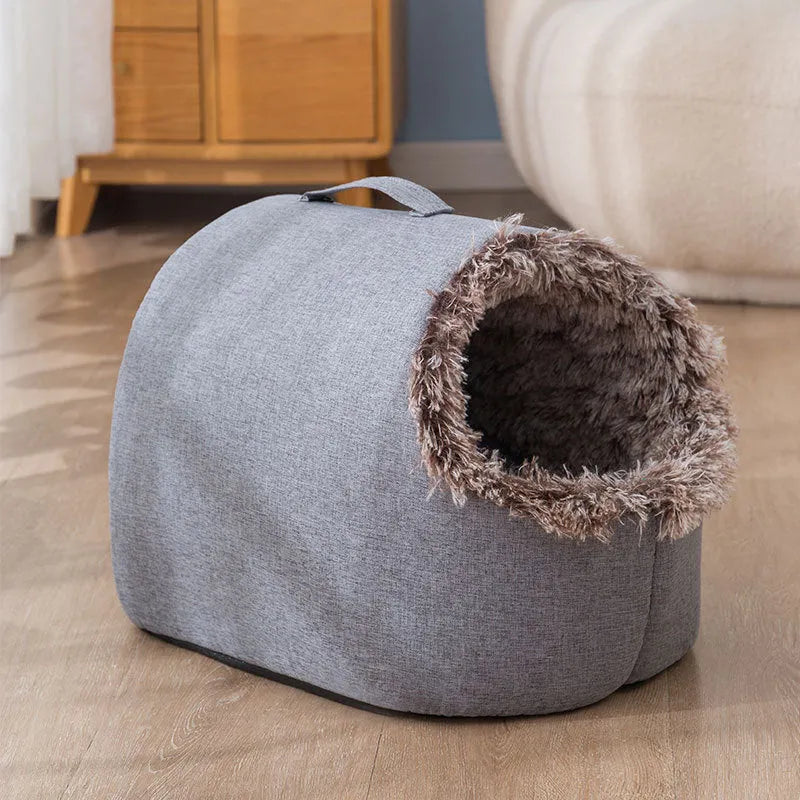 Fleece-lined enclosed cat bed with sleeping bag design shown in grey and brown colour options