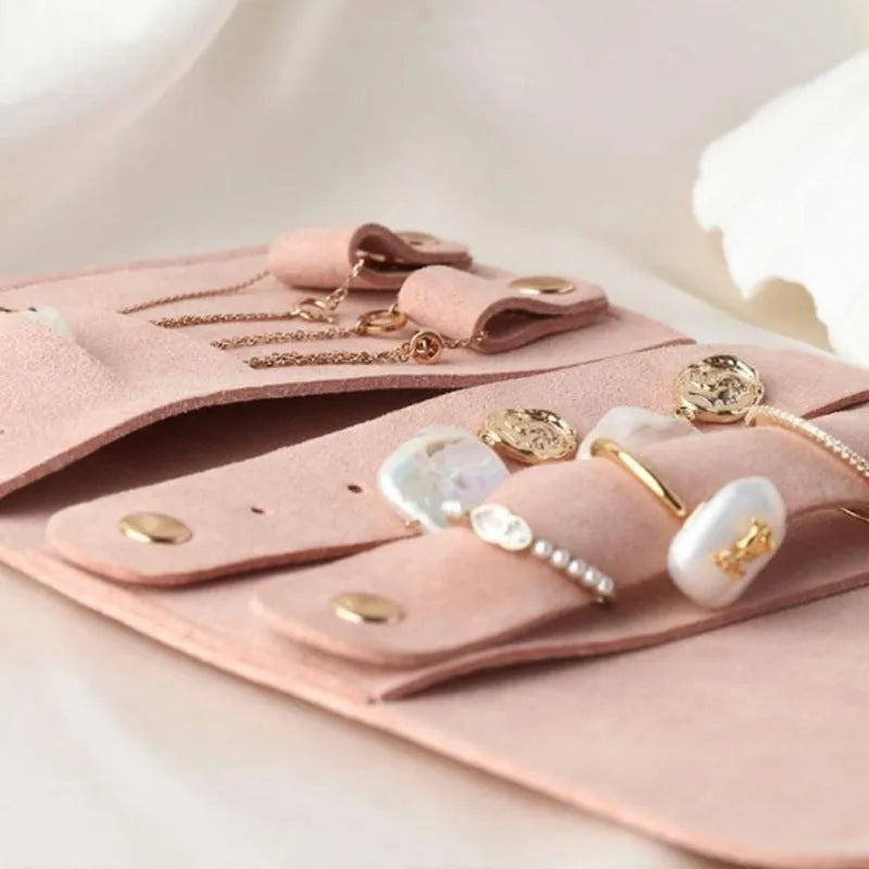 Brown leather 12x12cm jewellery storage bag with zip for earrings and watches.