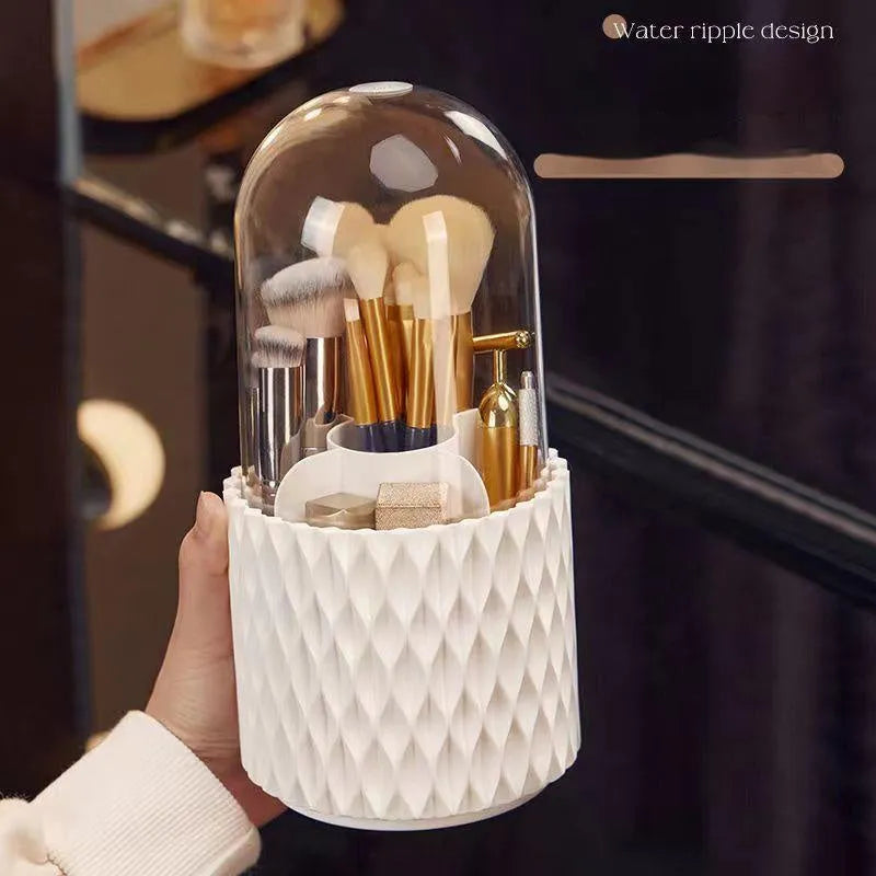 White rotating makeup brush storage holder with transparent lid on desktop