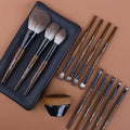 12-piece makeup brush set with wooden handles in protective PU brush bag