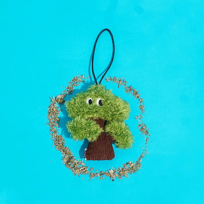 Cat toy with mint bag pendant attached to chewable teasing stick