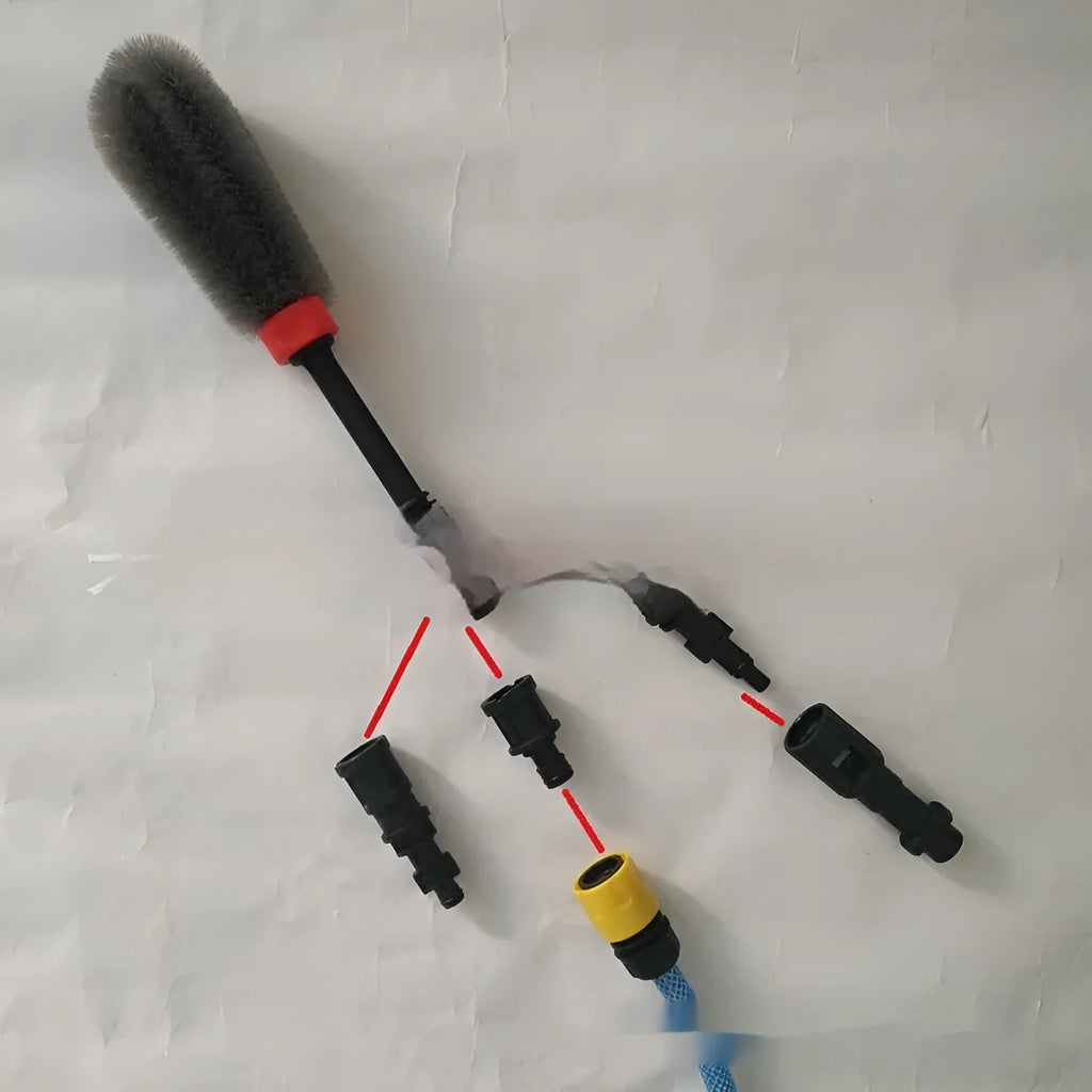Quick plug high-pressure car wash wheel hub brush with steel wire bristles and flow-through design