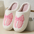 Cartoon bow knot cotton slippers in blue with suede upper and TPR sole.