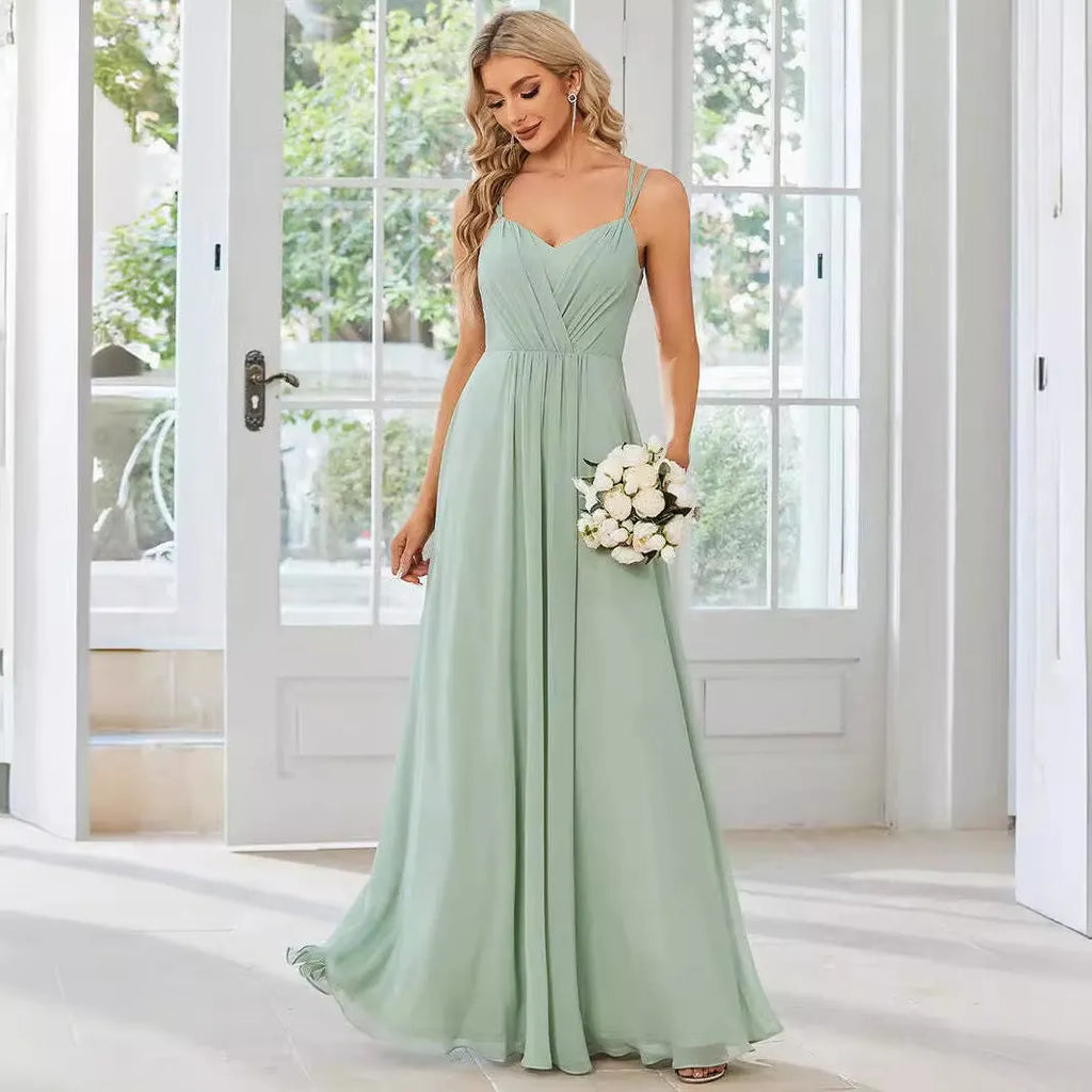 Women's sleeveless sling neckline banquet dress with long pleated A-line skirt
