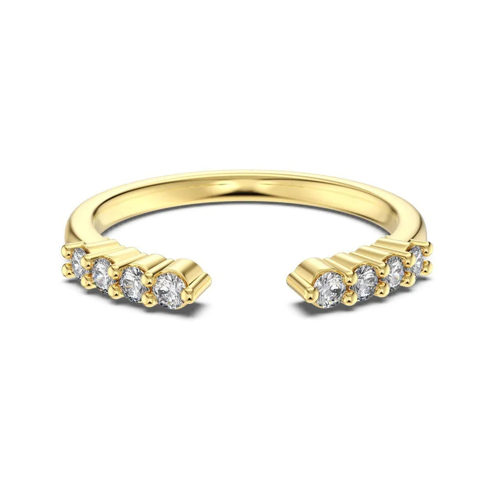 Sterling silver open ring with irregular wave design and adjustable opening on female hand