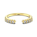 Sterling silver open ring with irregular wave design and adjustable opening on female hand