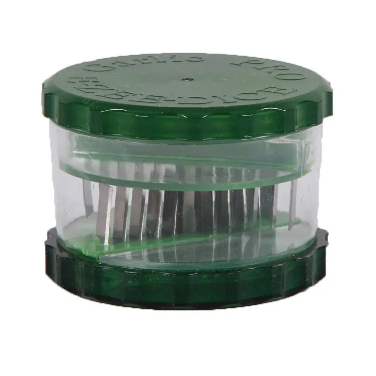 Green transparent PP plastic garlic peeler kitchen gadget with dimensions 8.5x8.5x6cm