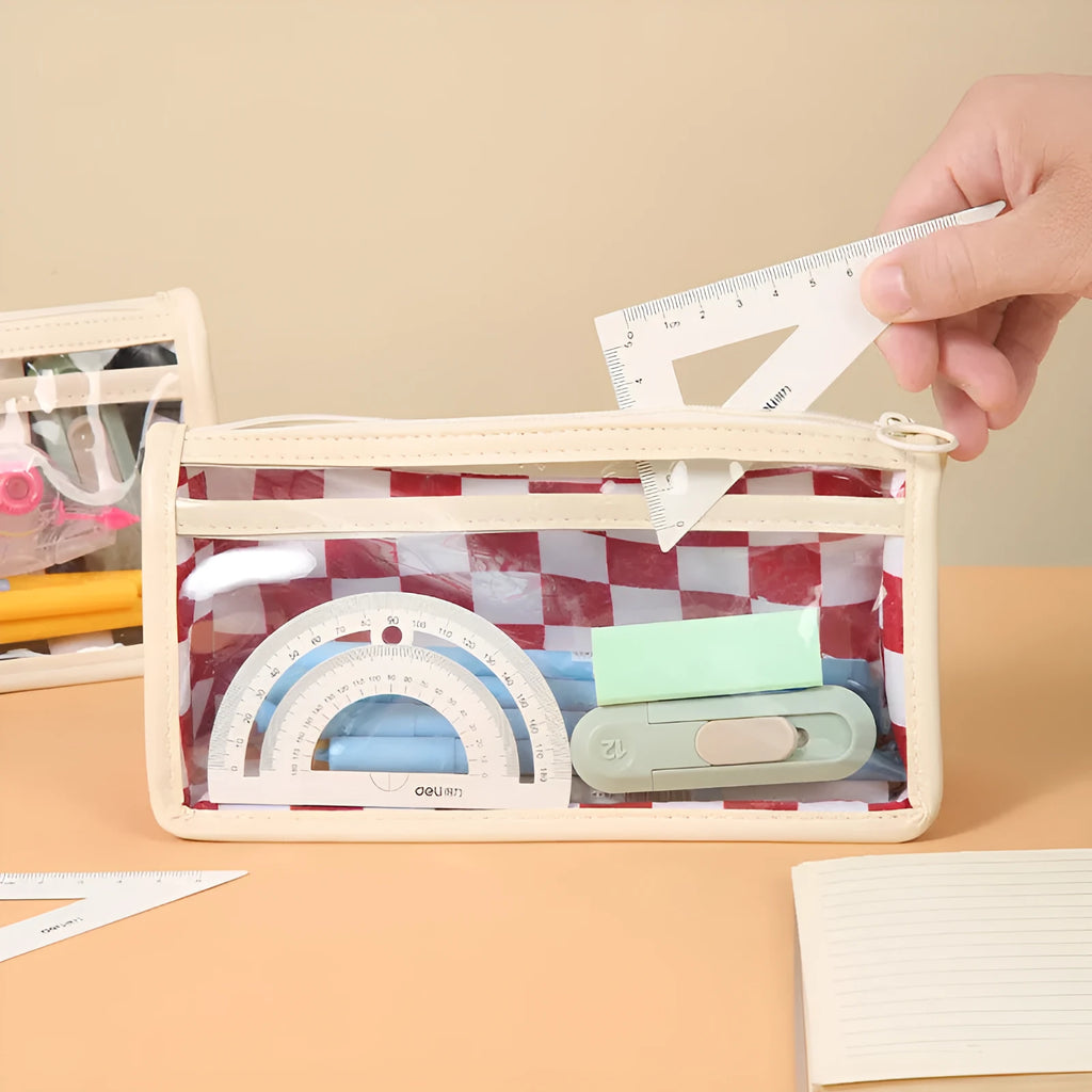 Transparent PVC pencil case with a chessboard grid pattern, showing pens inside.