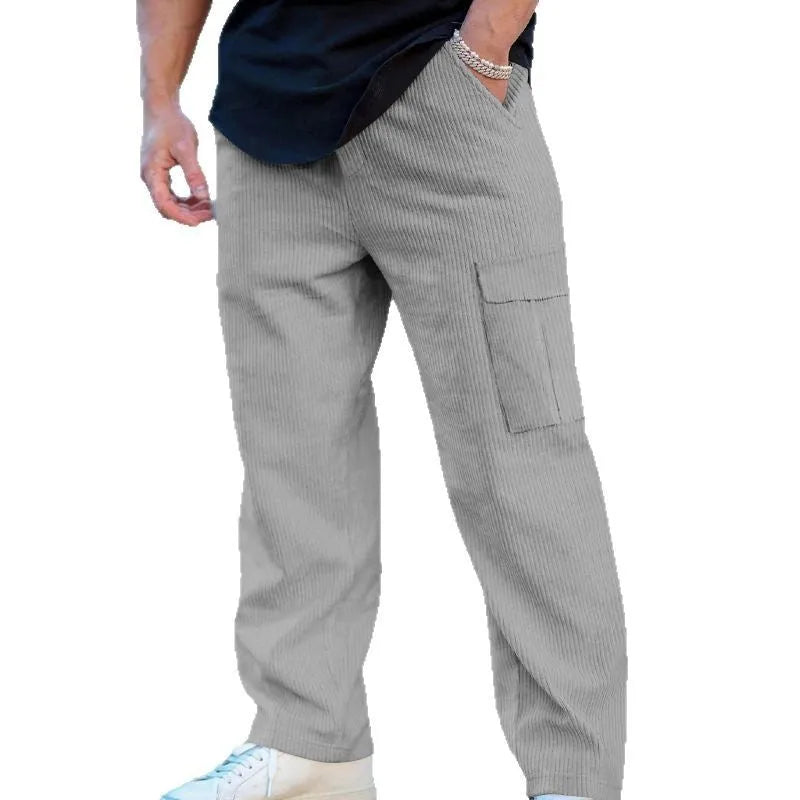 Men's corduroy cargo trousers in loose-fitting wide-leg style with drawstring waist