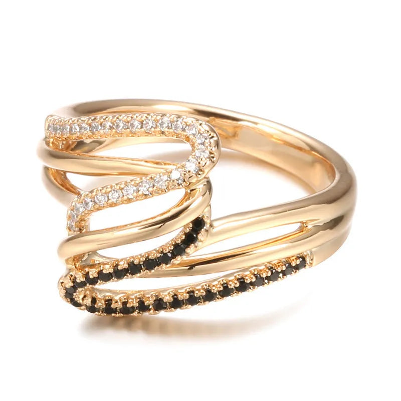 Close-up of a women's copper ring with micro-inlaid zircon stones and an electroplated finish.