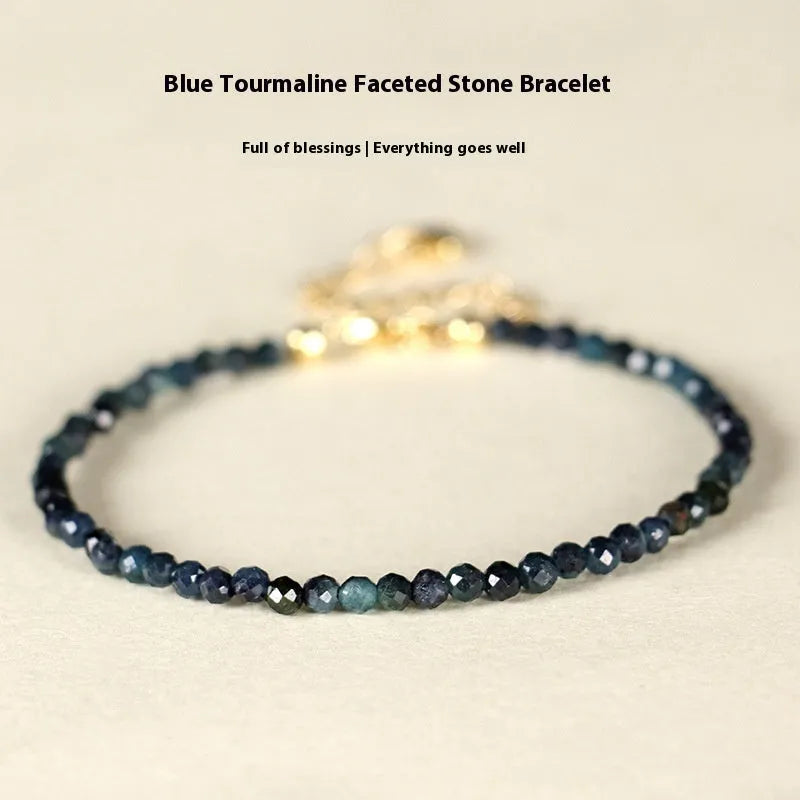 Blue tourmaline cut bead bracelet with 3mm faceted stones and spacer beads