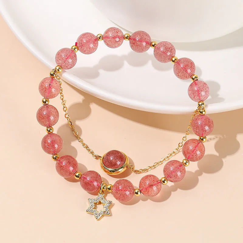 Green crystal bracelet with adjustable string closure on wrist