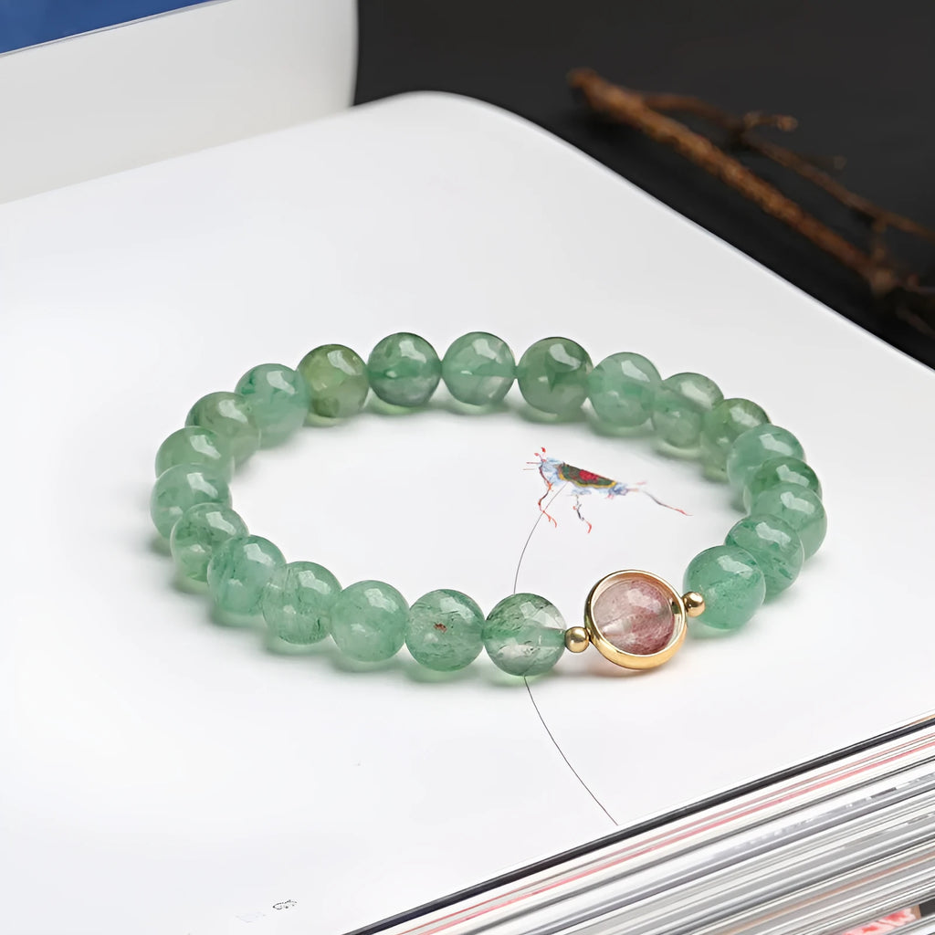 Natural green strawberry quartz bracelet with 7.5mm beads in geometric pattern