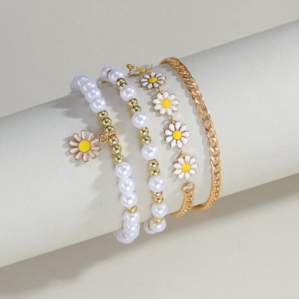 Four mixed material alloy bracelets with Little Daisy geometric charm in XY-4325 colour