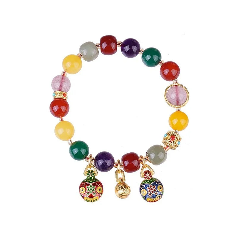 Hand-woven swallowing gold beast charm on 10mm agate bead bracelet