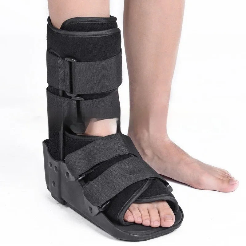 Grey and black Achilles tendon rehabilitation walking boot with adjustable straps