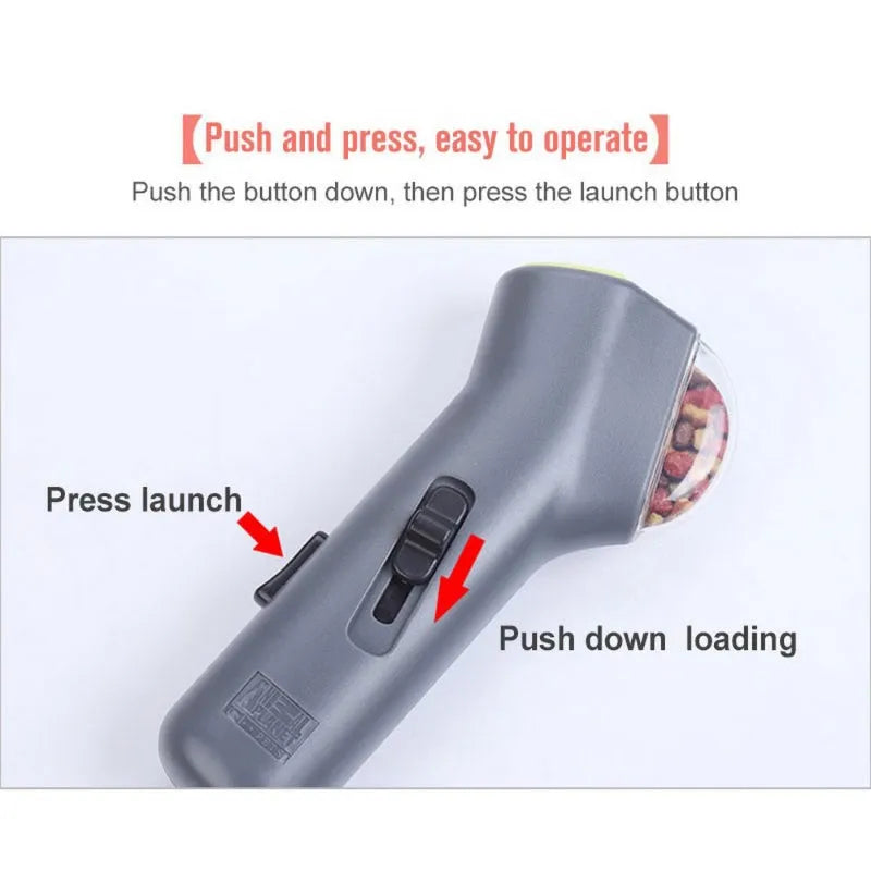 Grey dog treat catapult launcher measuring 18cm with spring trigger mechanism