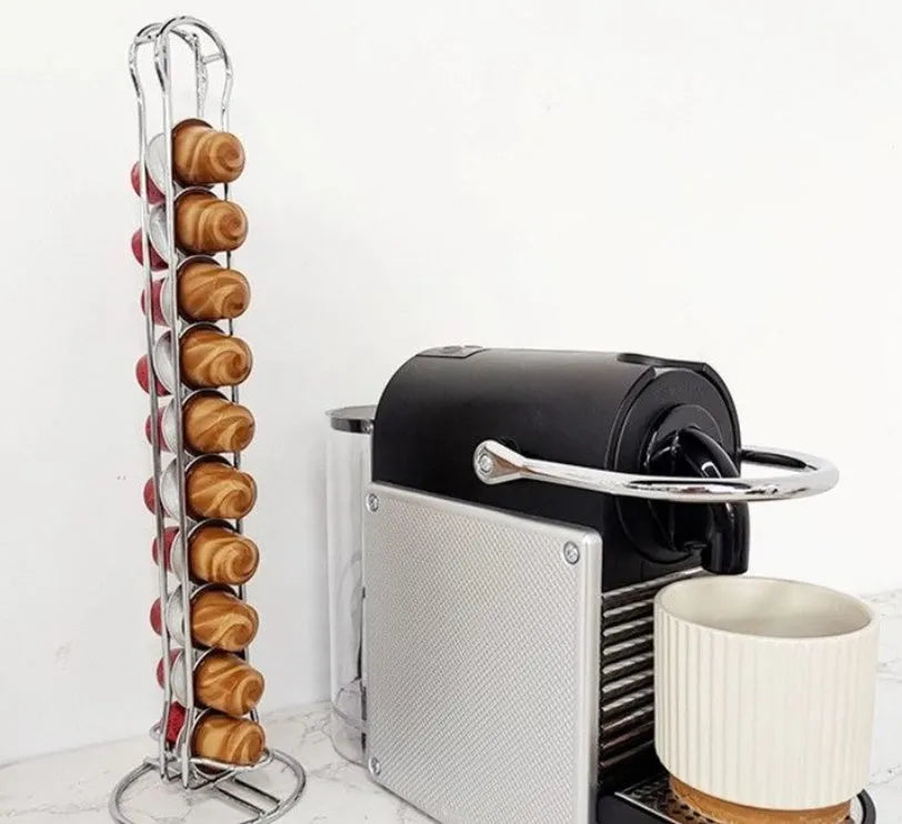 Black wrought iron coffee capsule storage rack holding pods on shelving, modern simple design.