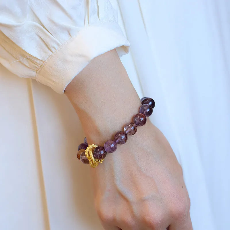 Purple cornucopia crystal bracelet with animal zodiac modelling in retro style