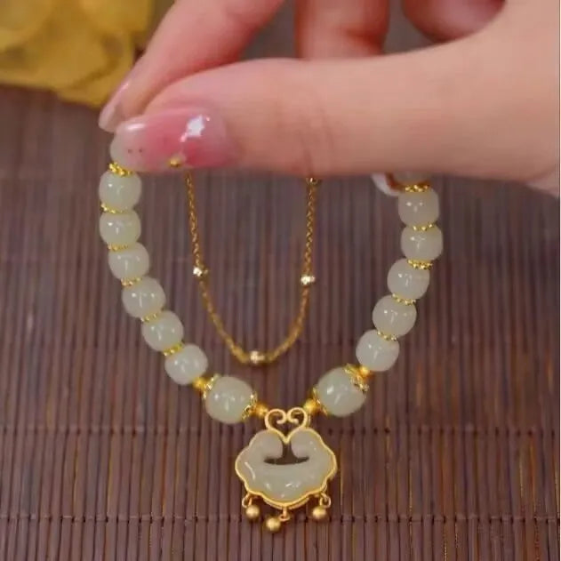 Green women's safety lock bell pendant bracelet with electroplated finish and double-layer construction