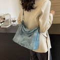 Large capacity women's casual shoulder bag in PU with sewing thread detail, available in denim blue, khaki, dark brown, light blue