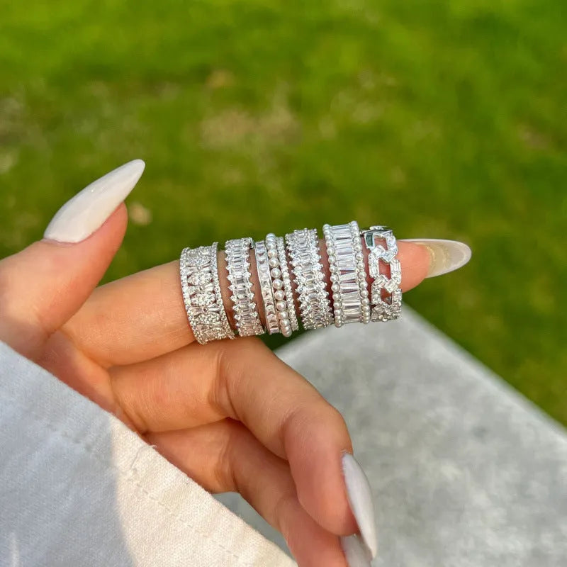 Sterling silver geometric ring with high-grade zircon inlay and freshwater pearl, sizes 5 to 9