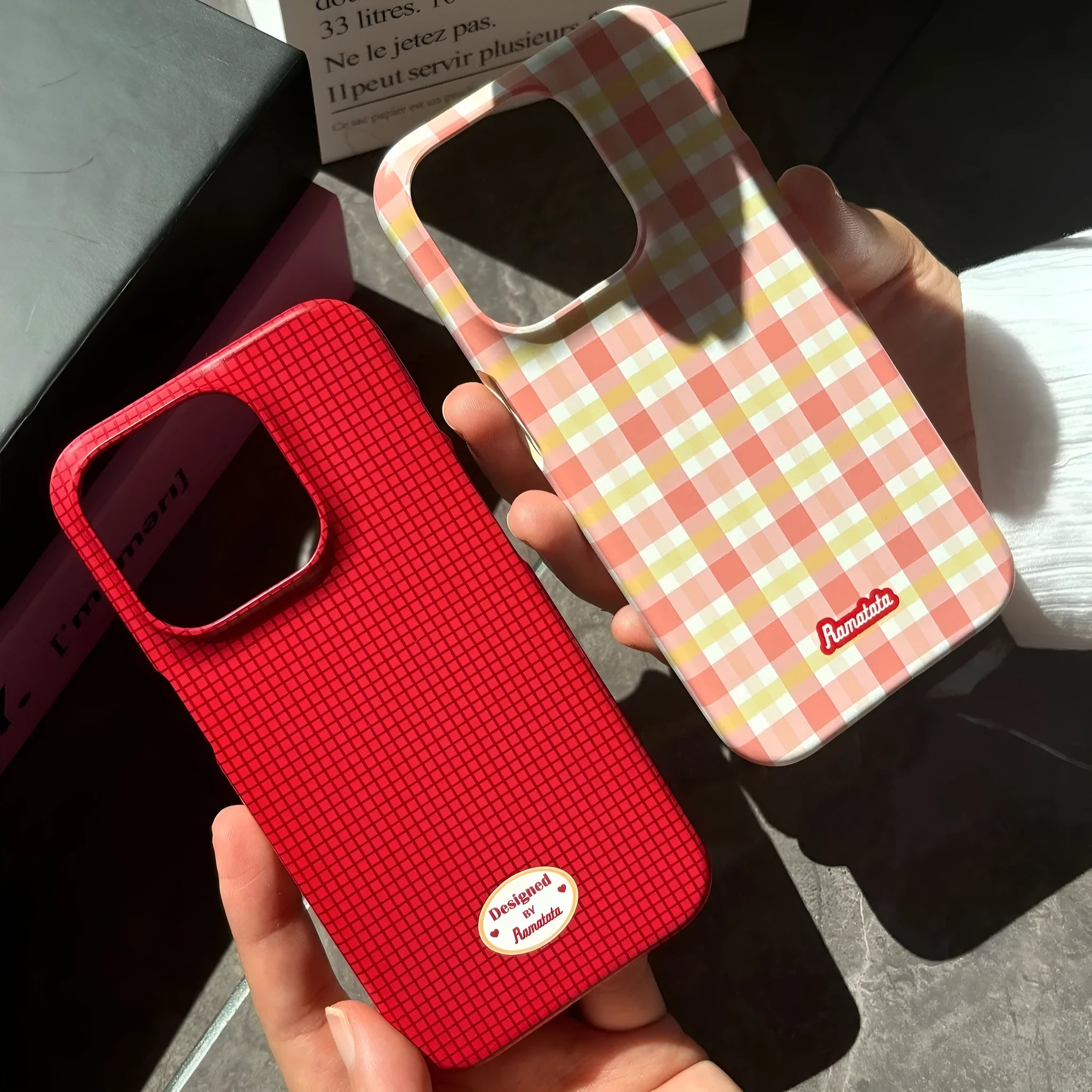 Original plaid design iPhone 15 Pro Max phone case in red and orange grid patterns with frosted and glossy finish options.