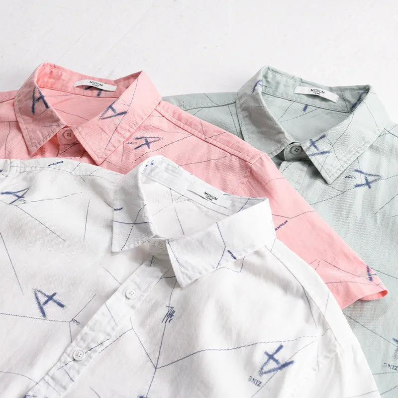 Women's loose fit short sleeve cotton cardigan shirt in light green, light pink or white.