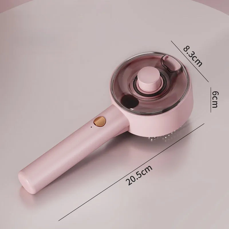 Pink and white cat grooming brush with mist spray function and stainless steel comb