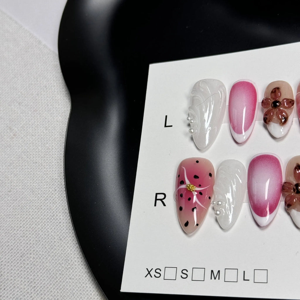 Hand-painted 3D carved nail art patches with embossed candy pattern on an Almond-shaped nail.