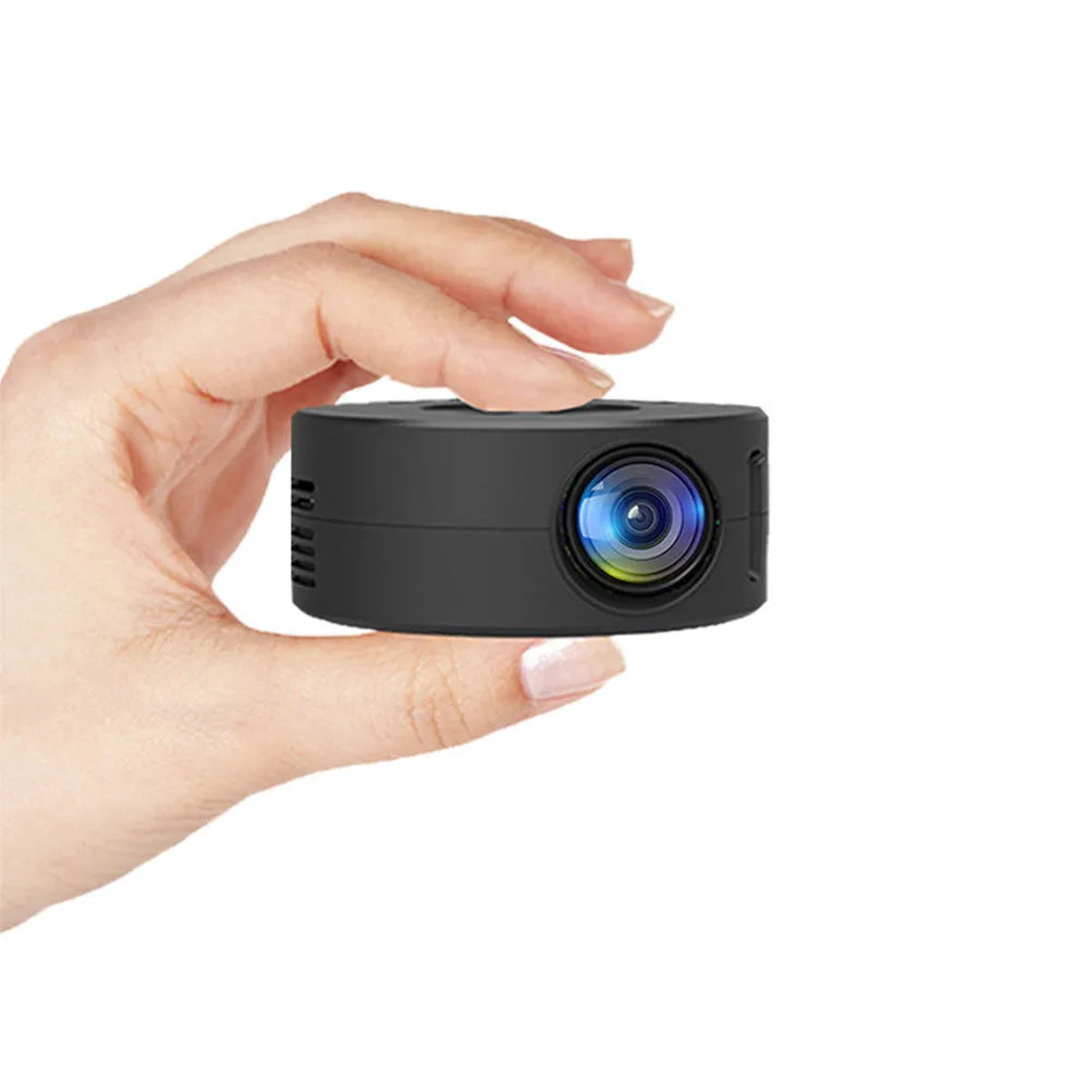 Black mini portable children's projector for mobile phones measuring 110mm