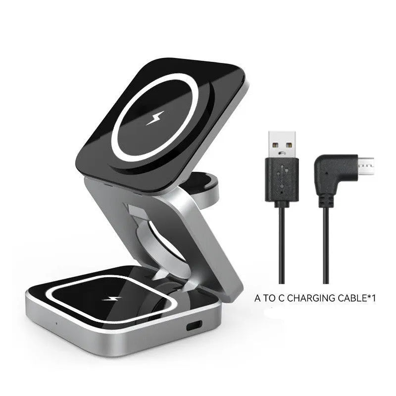 Folding three-in-one desktop wireless charging bracket with magnetic ring on a desk.