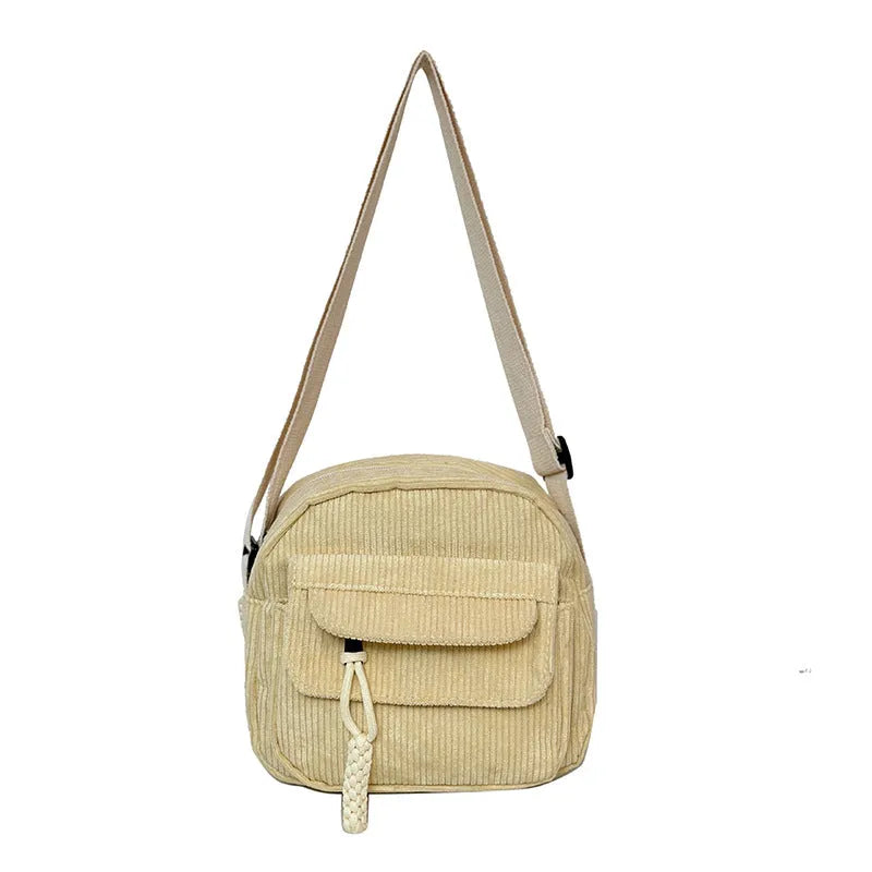 Corduroy crossbody shoulder bag in black with ribbon pendant, horizontal square shape