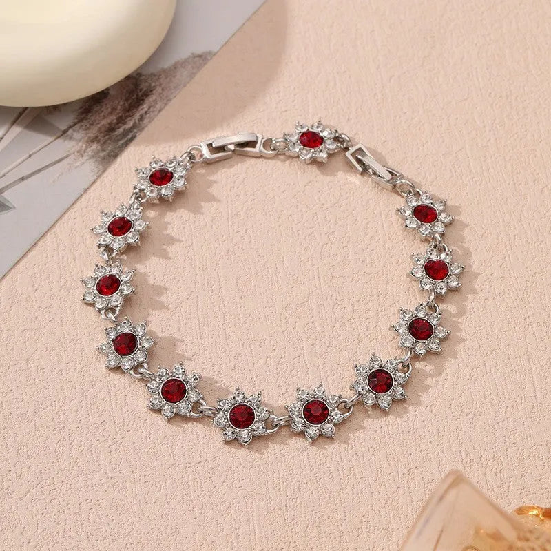 Women's zinc alloy bracelet with flower design and electroplated finish in gold and silver colour options